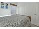 Well-lit bedroom featuring neutral tones and geometric-patterned bedding at 18230 E El Viejo Desierto --, Gold Canyon, AZ 85118