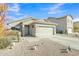Charming single-story home featuring a low maintenance yard and attached two-car garage at 18230 E El Viejo Desierto --, Gold Canyon, AZ 85118