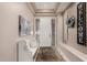 A welcoming foyer featuring tile flooring, a decorative rug, and a comfortable bench at 1919 E Gary Way, Phoenix, AZ 85042
