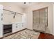 Stylish laundry room with white cabinets, a beverage refrigerator, and decorative touches at 1919 E Gary Way, Phoenix, AZ 85042