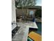 Relaxing patio with pool access, desert landscaping, and stylish decor for outdoor living and entertaining at 1919 E Gary Way, Phoenix, AZ 85042