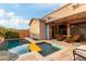Tranquil pool view featuring water floatation and lounge furniture under a covered patio at 1919 E Gary Way, Phoenix, AZ 85042
