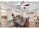 This dining area features tile flooring, recessed lighting, and a contemporary ceiling fan at 19217 N Concho Cir, Sun City, AZ 85373