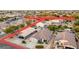 Neighborhood aerial view showing houses, desert landscaping, parks and street layouts at 1942 E Connemara Dr, San Tan Valley, AZ 85140