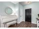 Bright entryway featuring a piano, modern decor, and dark wood floors at 1942 E Connemara Dr, San Tan Valley, AZ 85140