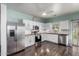Bright kitchen featuring white cabinets, stainless steel appliances, and butcher block countertops at 1942 E Connemara Dr, San Tan Valley, AZ 85140