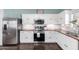 Well-lit kitchen with stainless appliances, white cabinets, and butcher block countertops at 1942 E Connemara Dr, San Tan Valley, AZ 85140