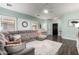 Spacious living area with a large sectional sofa and plenty of natural light at 1942 E Connemara Dr, San Tan Valley, AZ 85140