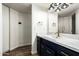 Updated bathroom features modern vanity, stylish fixtures, and plenty of storage space at 2228 N 52Nd St # 245, Phoenix, AZ 85008