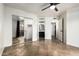 This bedroom includes a ceiling fan, access to the en suite bath, and walk-in closet at 2228 N 52Nd St # 245, Phoenix, AZ 85008