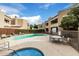 Community pool and seating area at 2228 N 52Nd St # 245, Phoenix, AZ 85008