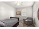 Bedroom with comfortable gray chair and painting on the wall at 22538 E Tierra Grande --, Queen Creek, AZ 85142