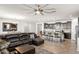 Open floor plan featuring kitchen island, dining area and a living room at 22538 E Tierra Grande --, Queen Creek, AZ 85142