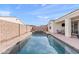 Enjoy this private in-ground pool with attached hot tub, ready for outdoor enjoyment and relaxation at 22538 E Tierra Grande --, Queen Creek, AZ 85142
