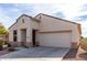 Charming single-story home with a two-car garage and low-maintenance desert landscaping at 22565 W La Pasada Blvd, Buckeye, AZ 85326