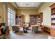 The library features cozy seating and extensive bookshelves, providing a quiet retreat at 22565 W La Pasada Blvd, Buckeye, AZ 85326