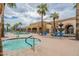 Hot tub and swimming pool next to a clubhouse, providing a luxurious and social lifestyle at 22565 W La Pasada Blvd, Buckeye, AZ 85326