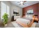 Bedroom with a minimalist design, featuring warm colors and neutral tones throughout at 2320 E Allen St, Phoenix, AZ 85042