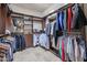Walk-in closet featuring custom shelving and storage solutions at 2320 E Allen St, Phoenix, AZ 85042