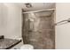 Bathroom with a tiled shower and glass door at 2442 E University Dr # 6, Mesa, AZ 85213