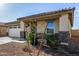 Attractive single-story home with desert landscaping and a two car garage at 24531 W Cocopah St, Buckeye, AZ 85326