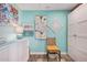 Bright bonus room showcasing blue walls, white furniture, and natural textures at 2511 W Queen Creek Rd # 163, Chandler, AZ 85248