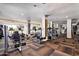 Well-equipped gym featuring modern exercise machines and plenty of natural light at 2511 W Queen Creek Rd # 163, Chandler, AZ 85248