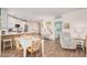 Open-concept kitchen features island with barstool seating, stainless steel appliances and ample counter space at 2511 W Queen Creek Rd # 163, Chandler, AZ 85248