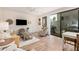 Bright living room with access to a patio, comfortable seating, and decorative accents at 2511 W Queen Creek Rd # 163, Chandler, AZ 85248