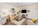 Cozy living room with comfortable seating, stylish decor, and a ceiling fan at 2511 W Queen Creek Rd # 163, Chandler, AZ 85248
