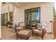 Cozy patio featuring comfortable wicker furniture and view of the community at 2511 W Queen Creek Rd # 163, Chandler, AZ 85248