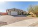 Charming single-Gathering home with brick driveway, two-car garage, and well-maintained landscaping at 25904 N 96Th Ln, Peoria, AZ 85383