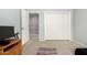 Bedroom view with a closet and an open doorway to another room at 2701 E Lockwood St, Mesa, AZ 85213
