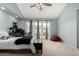 Spacious bedroom with French doors leading to the backyard and ample natural light at 2701 E Lockwood St, Mesa, AZ 85213