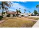Charming single-story home with a red tile roof and an attached two-car garage at 2701 E Lockwood St, Mesa, AZ 85213