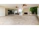 Expansive covered patio offering a shaded retreat with ceiling fans and outdoor workout area at 2701 E Lockwood St, Mesa, AZ 85213