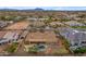 Aerial view of property showcasing backyard pool, mature landscaping and neighborhood at 2998 E Waterman Way, Gilbert, AZ 85297