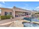 Expansive backyard with pool, hot tub, covered patio, and outdoor seating, perfect for entertaining at 2998 E Waterman Way, Gilbert, AZ 85297