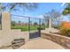 Secure backyard gate leading to lush common area at 2998 E Waterman Way, Gilbert, AZ 85297