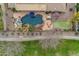 Aerial view of backyard showing pool, spa, putting green and patio at 2998 E Waterman Way, Gilbert, AZ 85297