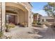 Stunning home entryway with a water fountain, potted flowers and a double-door entry at 2998 E Waterman Way, Gilbert, AZ 85297
