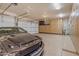 Spacious garage with epoxy flooring and custom cabinets, providing ample storage and organization at 2998 E Waterman Way, Gilbert, AZ 85297