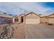 Charming single-story home featuring a low-maintenance desert landscape, tile roof, and a two-car garage at 316 W Kelton Ln, Phoenix, AZ 85023