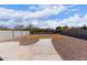 Large backyard with ample space, a blank canvas for creating your outdoor oasis at 37295 W Cannataro Ln, Maricopa, AZ 85138