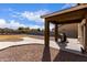 Covered patio with grill, perfect for outdoor cooking and entertaining at 37295 W Cannataro Ln, Maricopa, AZ 85138
