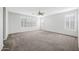 Large bedroom with carpeted floors and plantation shutters at 40975 N Arbor Ave, San Tan Valley, AZ 85140