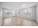 Bright living room showcasing tile floors, white walls, plantation shutters, and recessed lighting at 40975 N Arbor Ave, San Tan Valley, AZ 85140