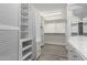 Walk-in closet with built-in shelving provides ample storage space and organization at 4800 N 68Th St # 385, Scottsdale, AZ 85251