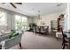 Bright common area with natural light, a large table and comfortable seating, ideal for relaxing and socializing at 4800 N 68Th St # 385, Scottsdale, AZ 85251