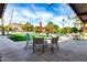Outdoor seating with a mountain view, surrounding the community pool area at 4800 N 68Th St # 385, Scottsdale, AZ 85251